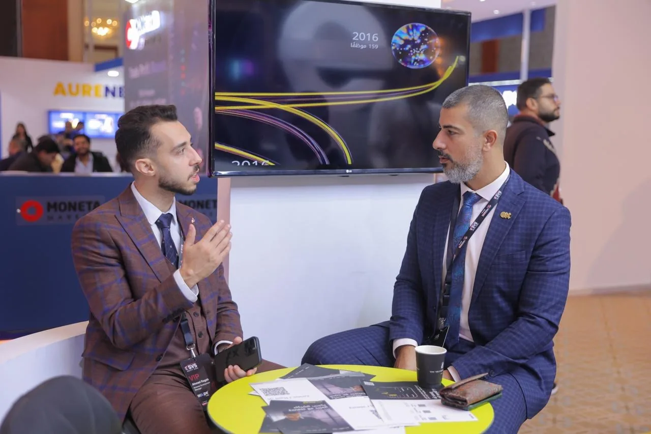 Business meeting at an exhibitor booth